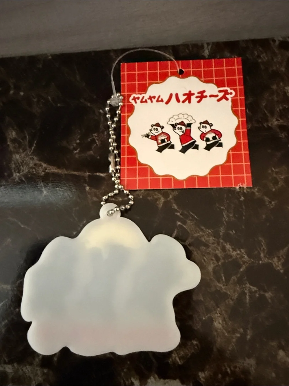 Cute Japanese Character Keychain with Red & White Design